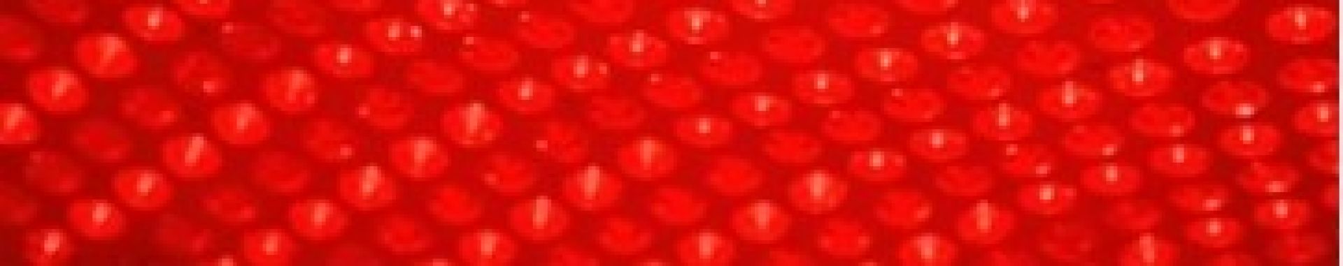 A play of light and shadow through a frosted window, creating a dramatic black and white effect.